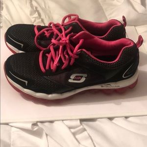 Black and pink running shoes